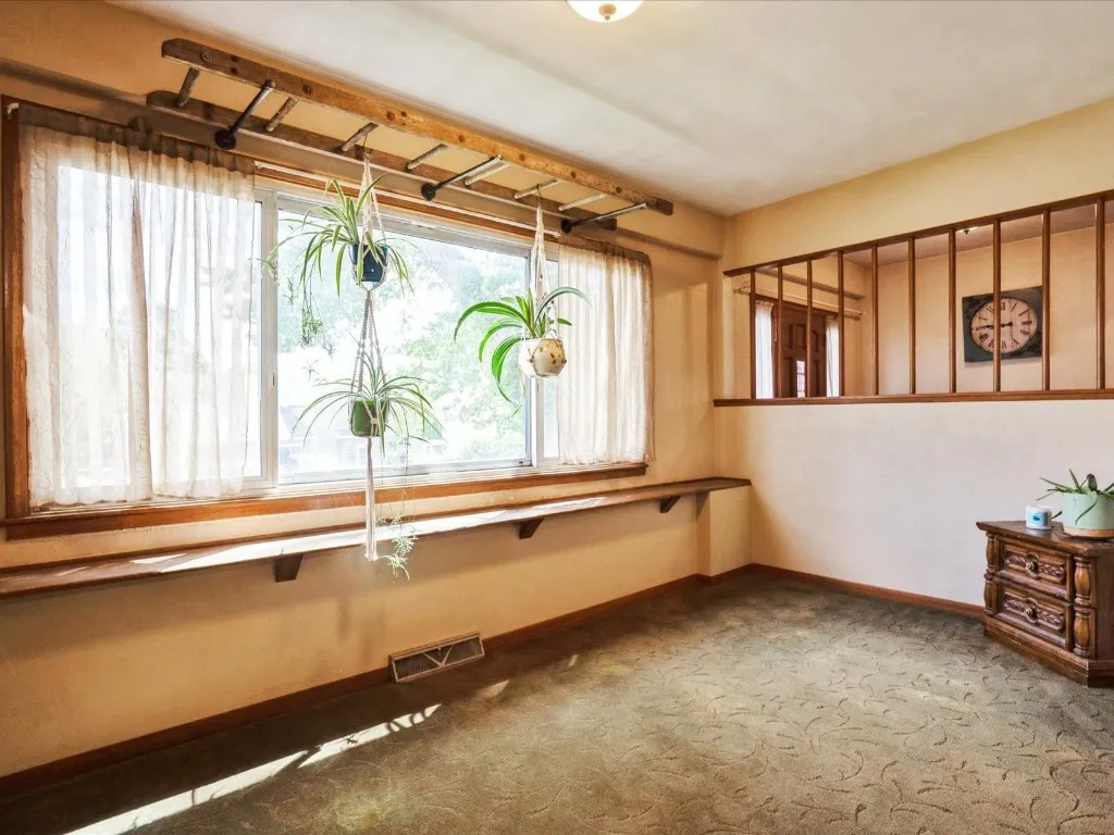 Large windows across front of home, main floor facing south