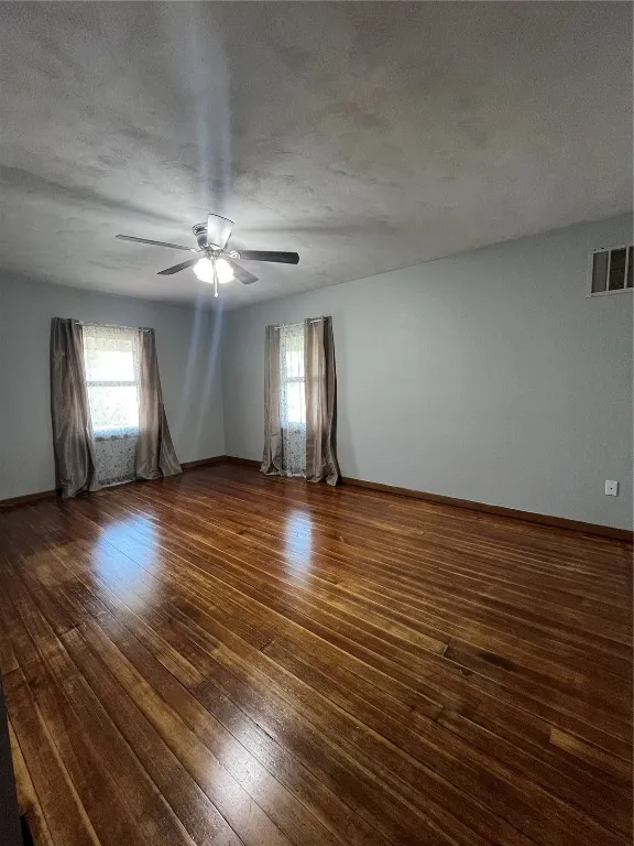Primary Bedroom after floor refinishing, Northeast facing