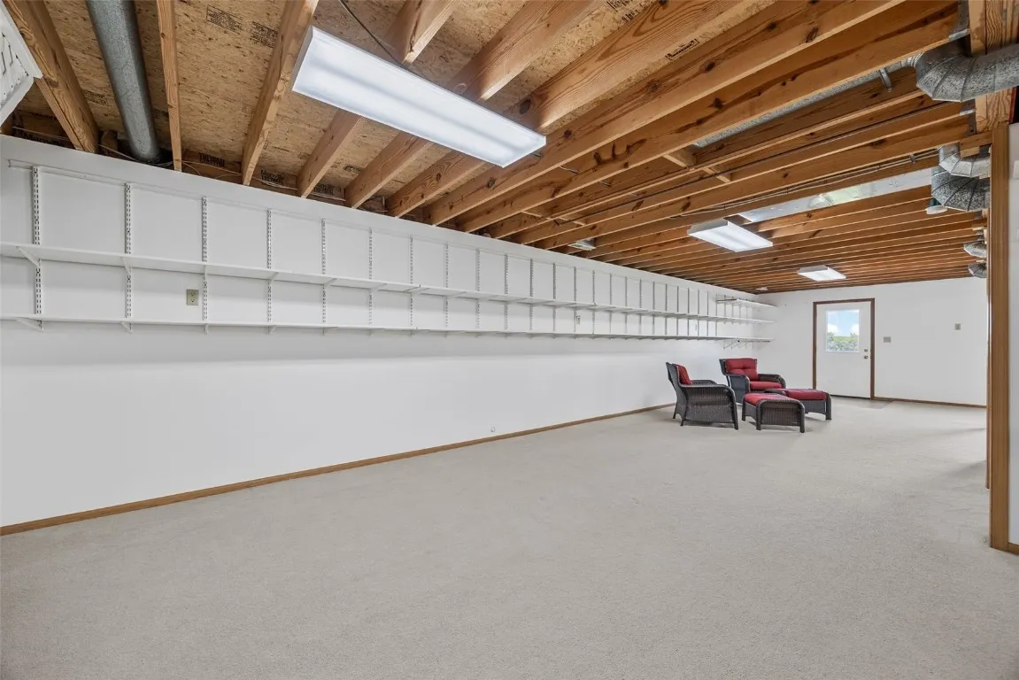 Lots of wall shelving in the lower level