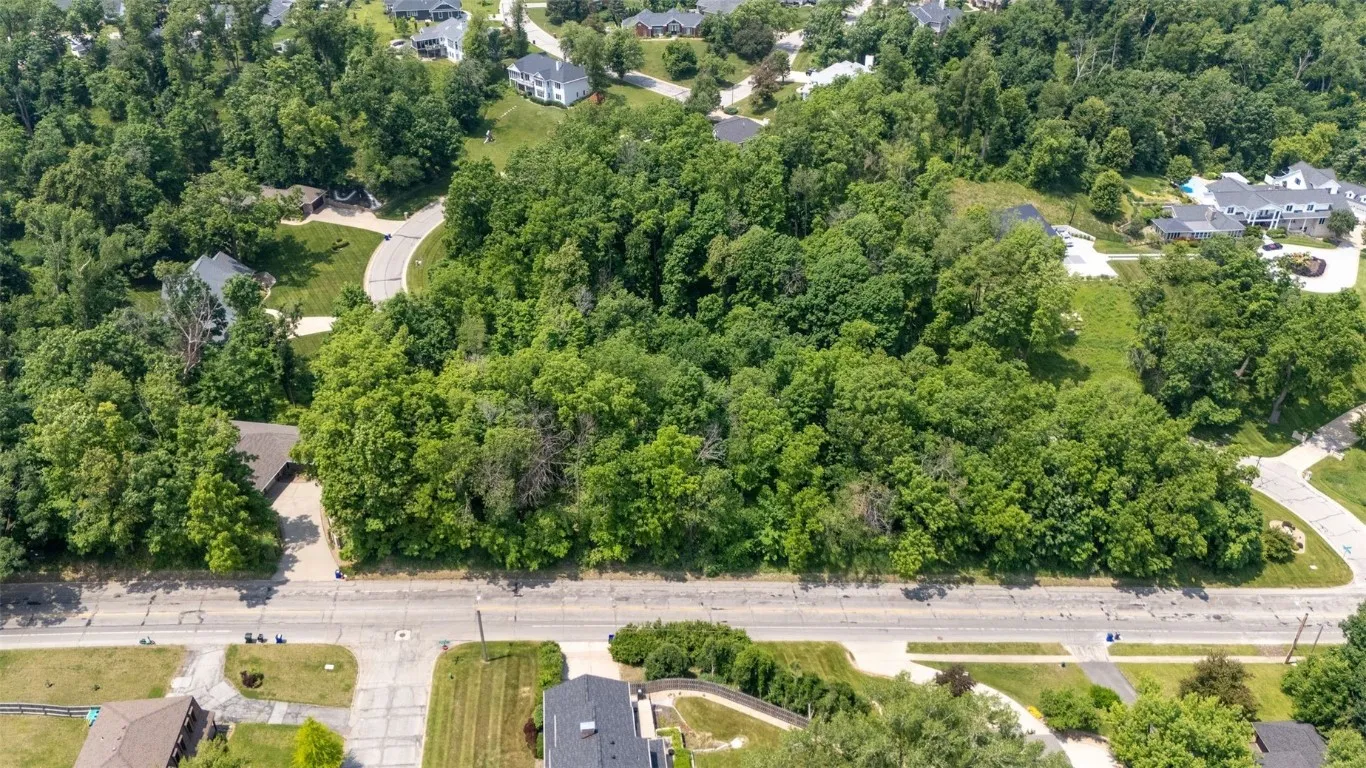 Fully wooded lot facing 34th St SE