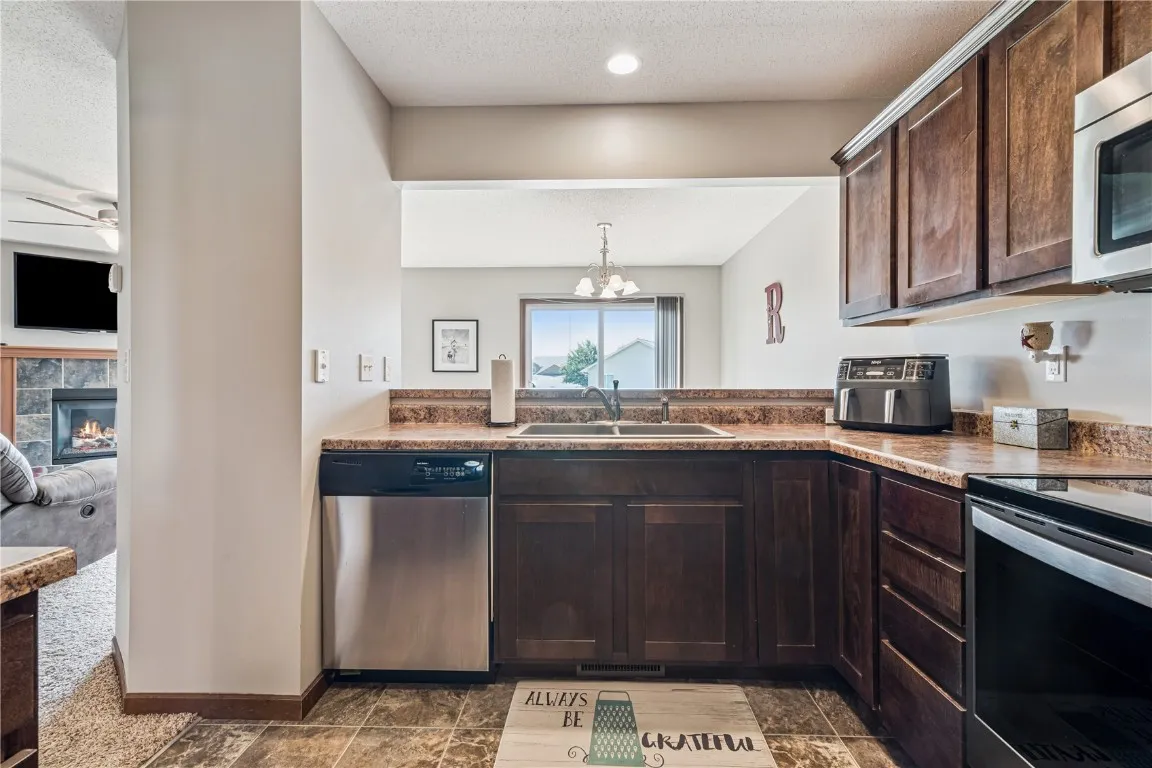 A view of the kitchen through to the dining area.