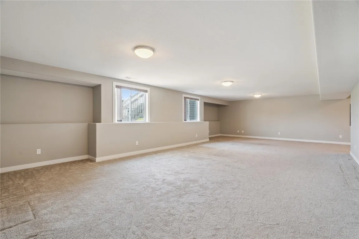 Rec room with 9' ceilings and daylight windows