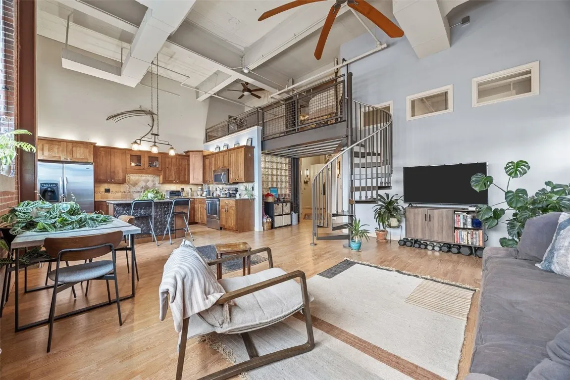 Living room open to the dining area and kitchen, with even more seating at spacious kitchen island