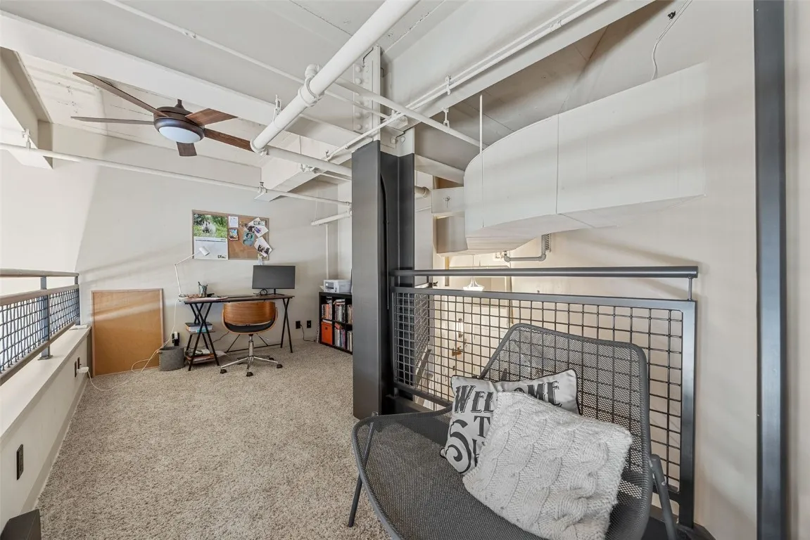 BONUS loft space! Enjoy another 100+ square feet up here. Shown as a perfect home office space here!