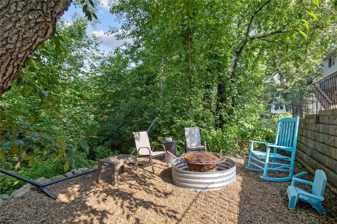 Backyard Fire pit and retaining wall (wooded)