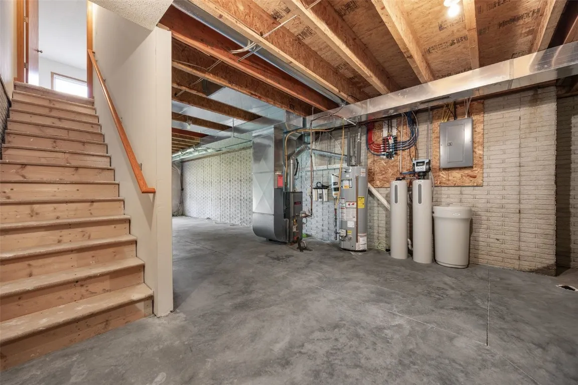 Lower level, unfinished.  Water softner: owned.