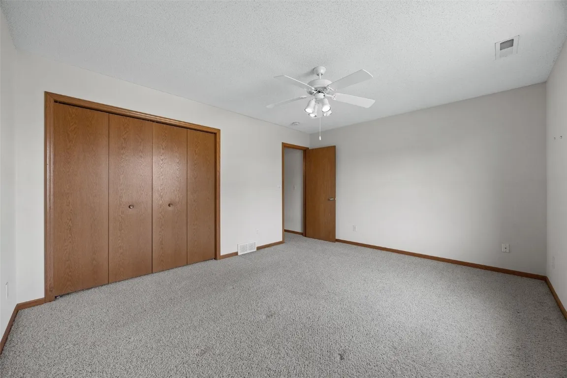 Generously sized closet in Bedroom 1.