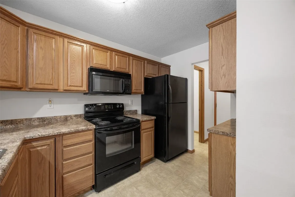 Ample cabinetry in kitchen.