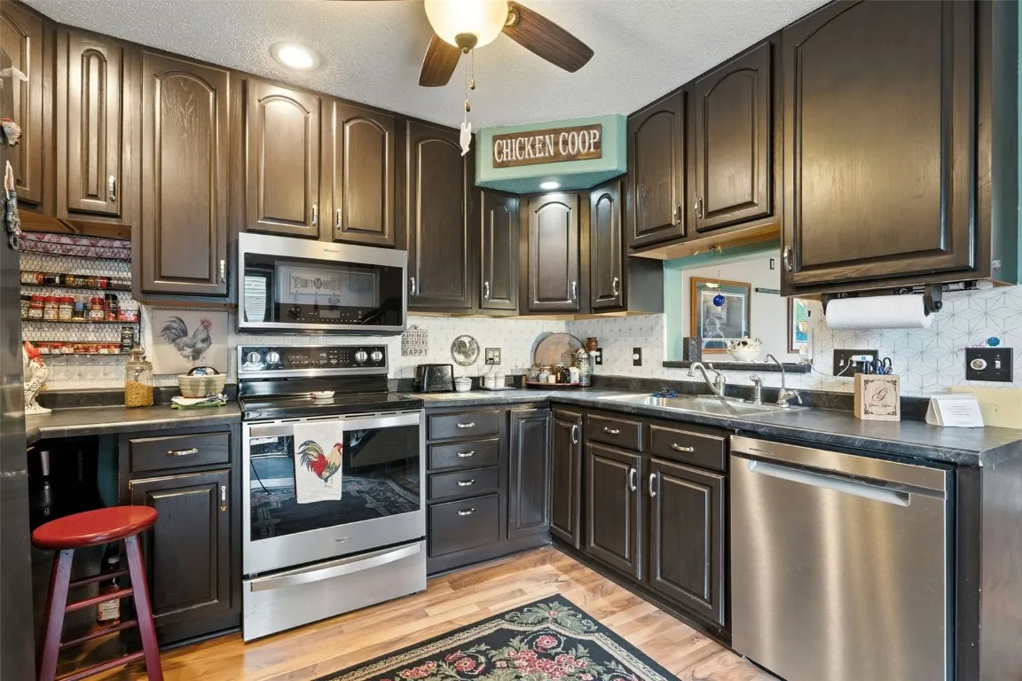Additional cabinets have been added by seller to fill every little gap and make this a functional kitchen