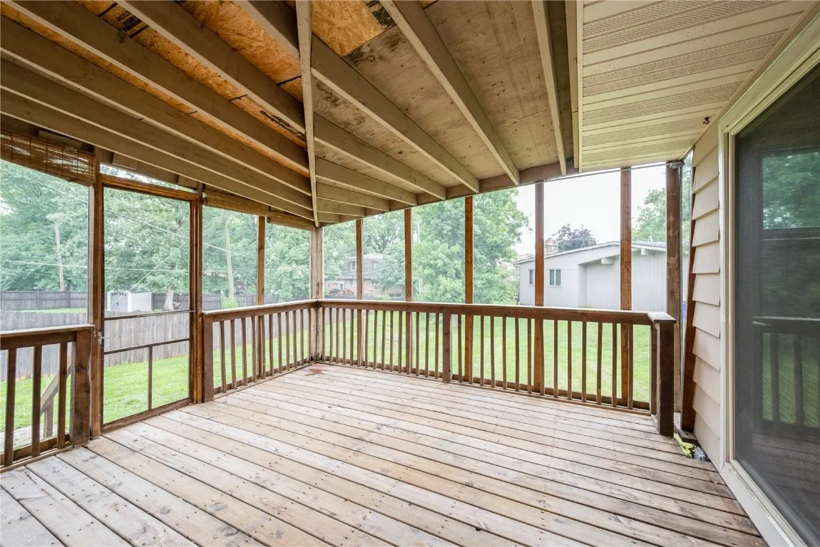 Covered & Screened. Overlooking lush yard