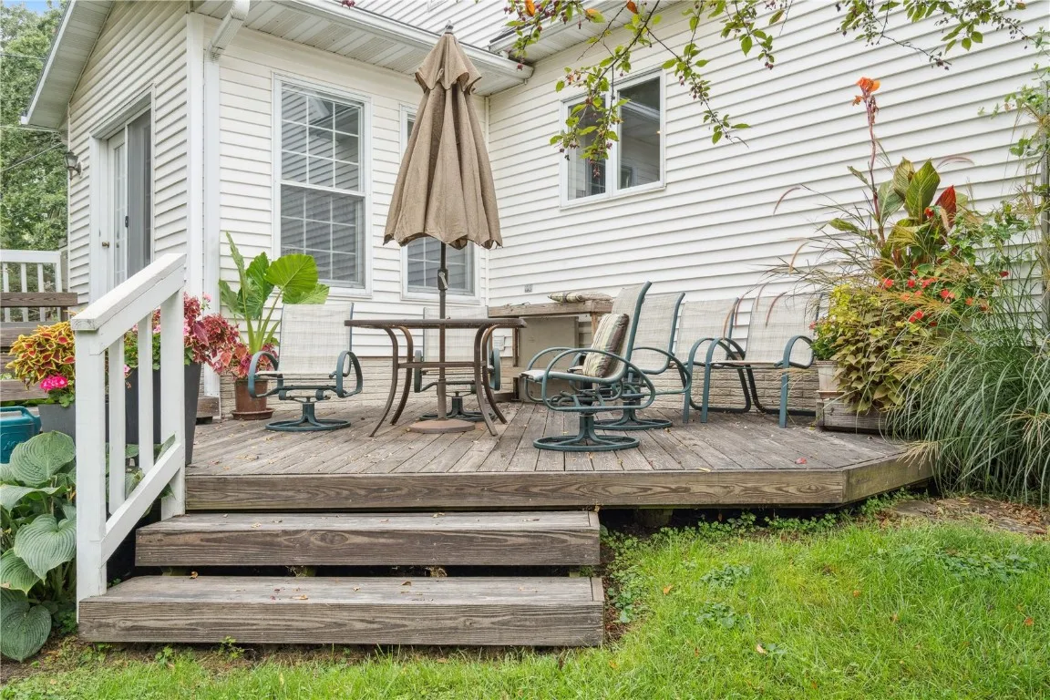 Rear deck with entrance to sunroom