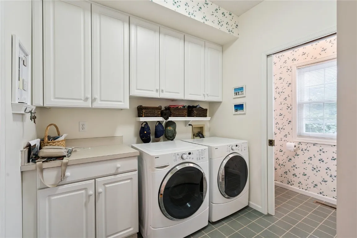 1st floor laundry with pocket door to half bath