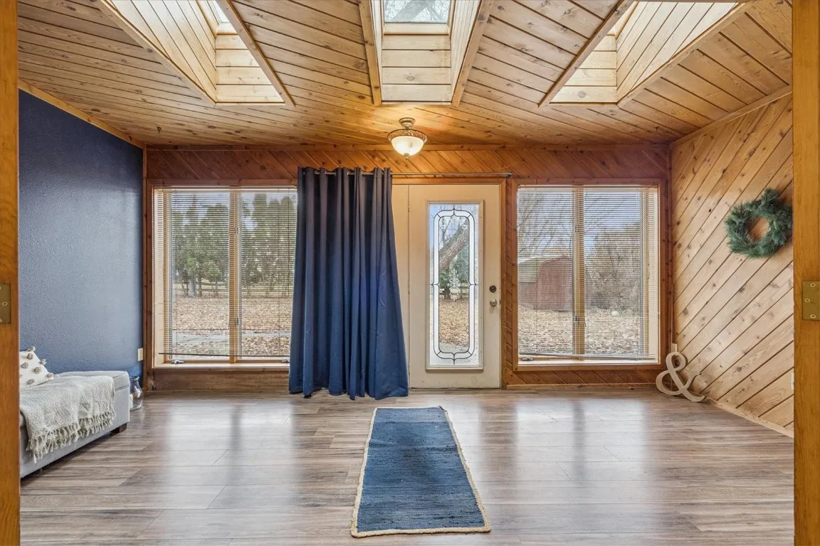 Front door foyer/sun room with skylights