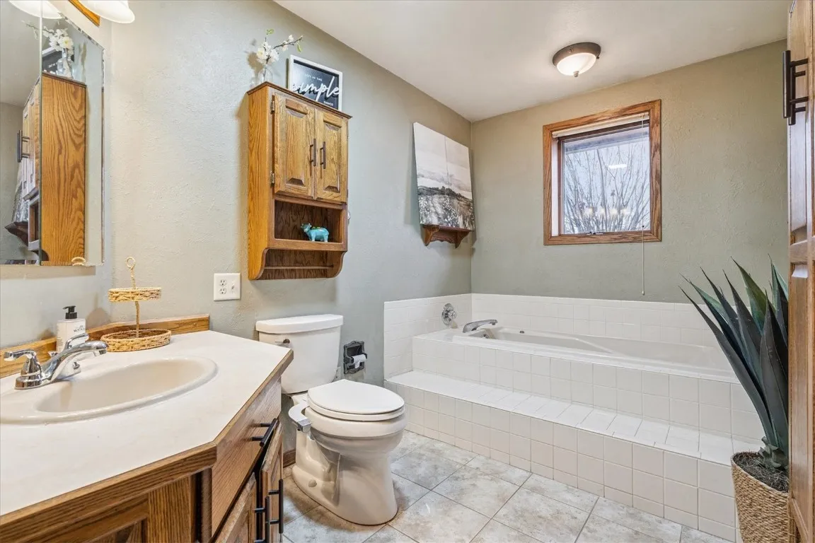 Full bath with whirlpool tub