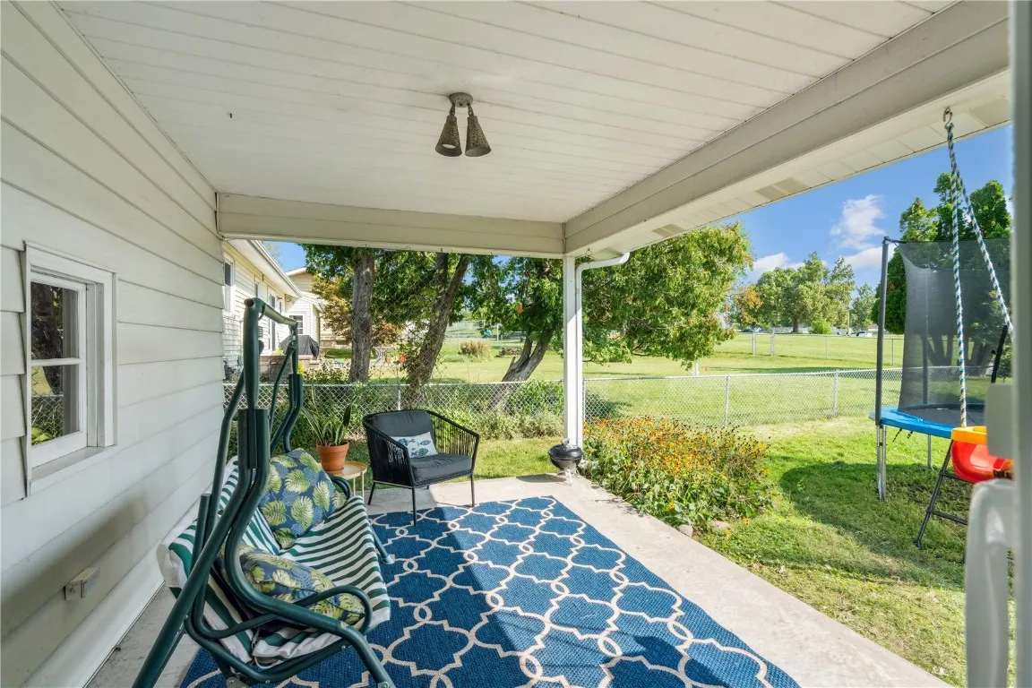 Covered patio overlooking the yard