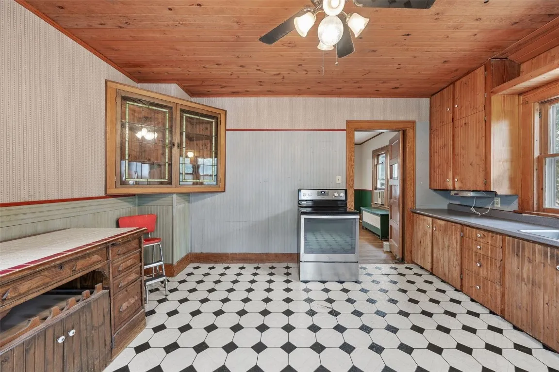 Kitchen view with door to dining room
