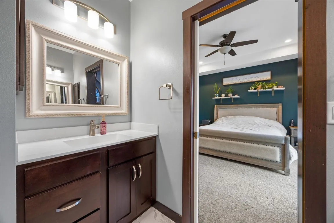 Primary Bath with individual vanities.