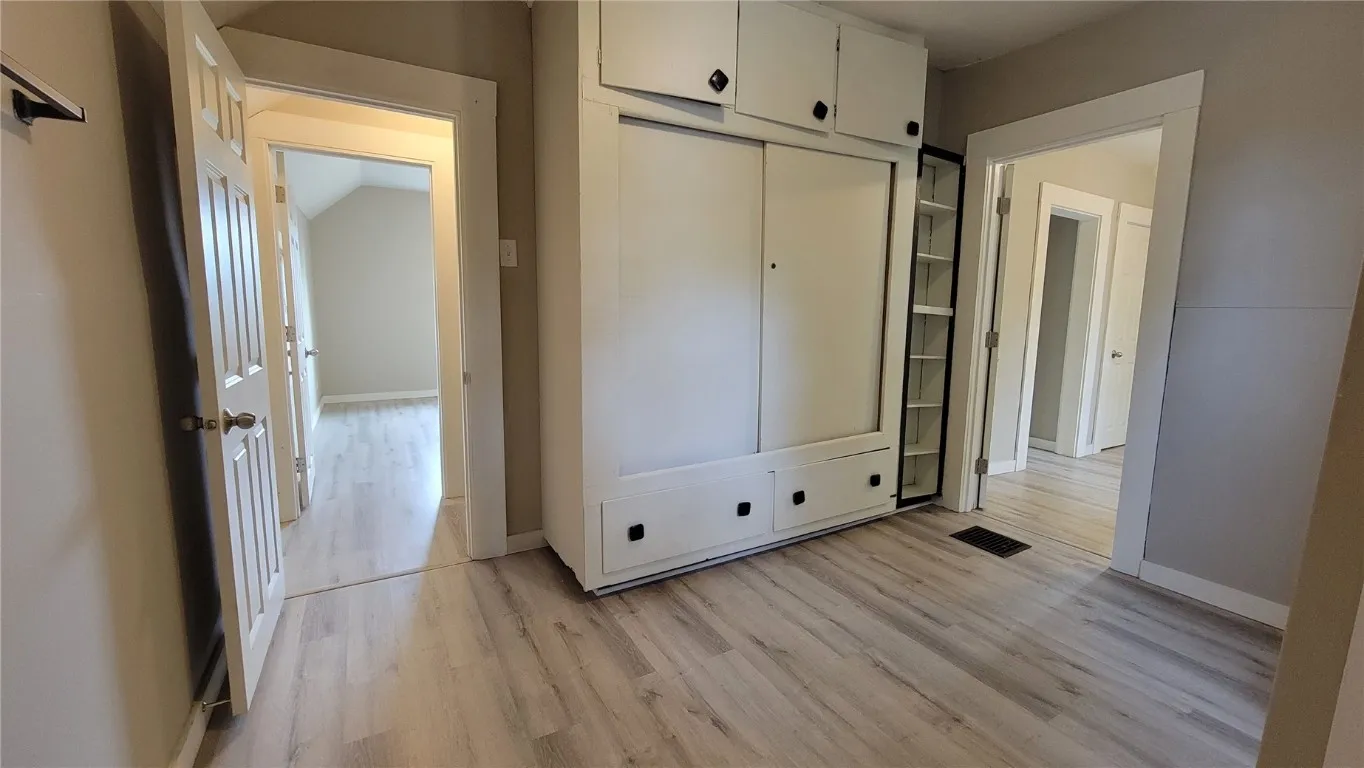 View From Tub/Shower to Bathroom Storage (plenty!), Bedroom #1 and Bedroom #4 Through Doorway on Right
