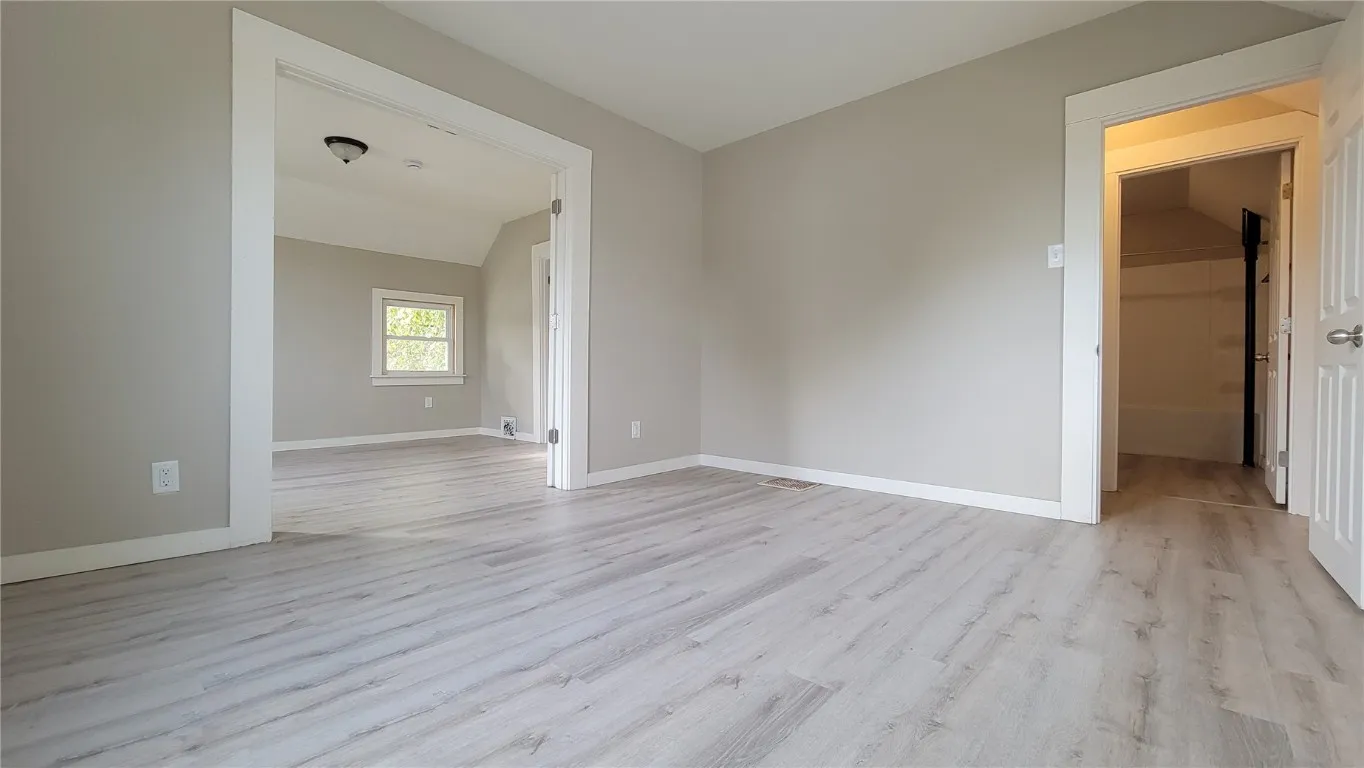View From Bedroom #1 to Bedroom #2 and View to Top of Stairway, Looking into Full Bathroom