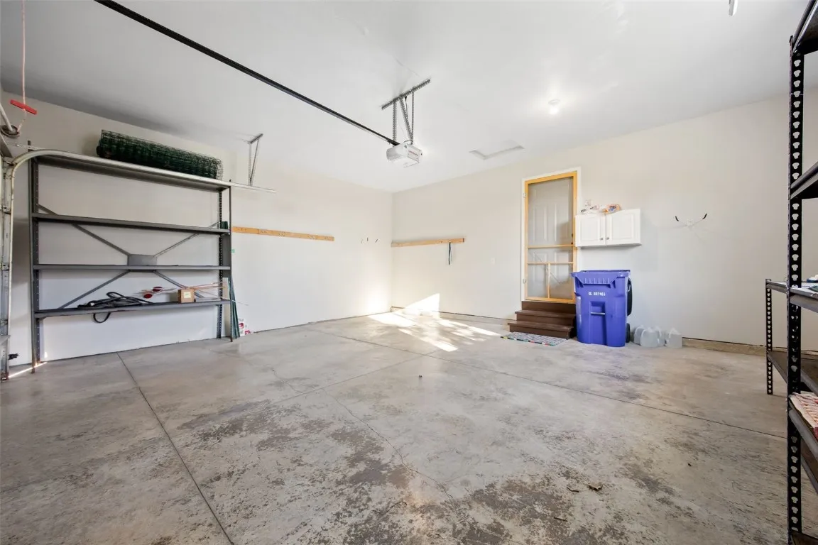 Two-car garage will accommodate vehicles and some storage.