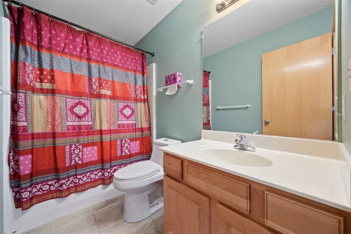 Main floor full bathroom.  Tub-shower combo.