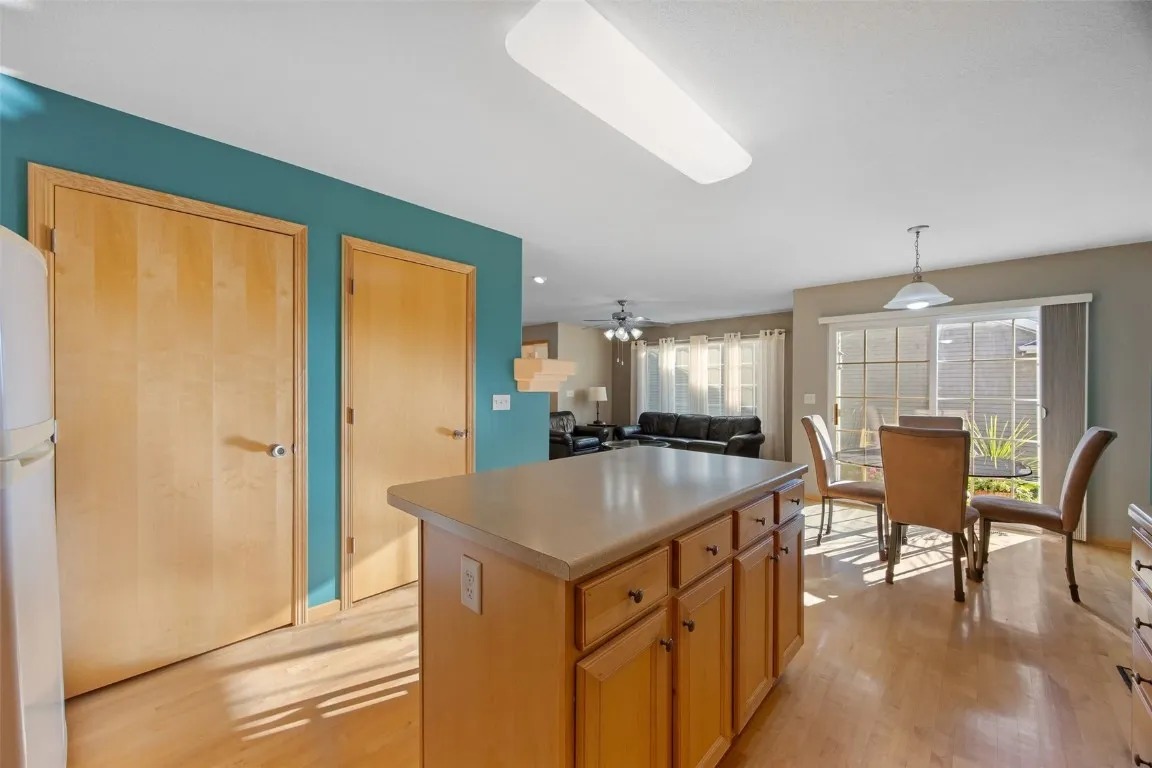 Informal dining area with sliders to semi-private patio.