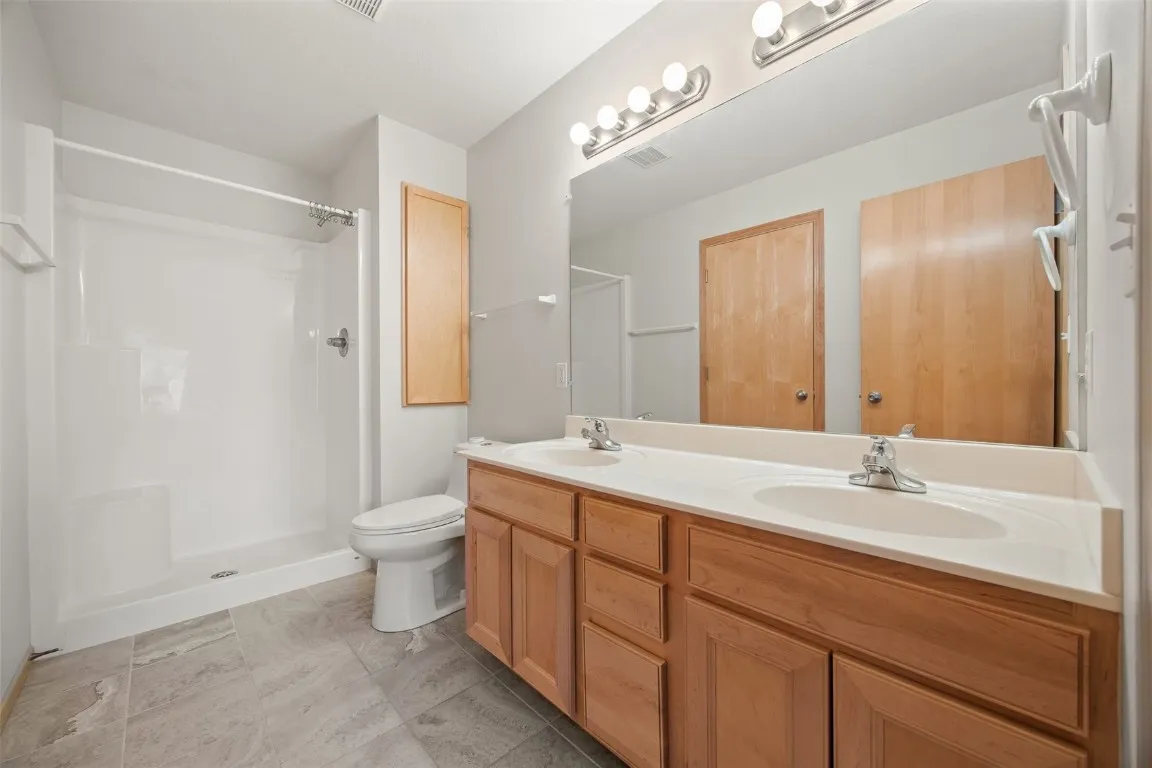 Private full bathroom within Primary bedroom.