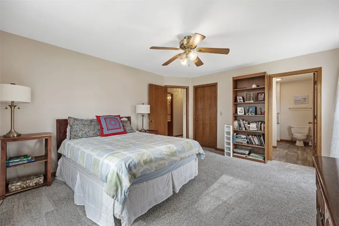 Master bedroom view towards walk in closet and attached master bathroom.