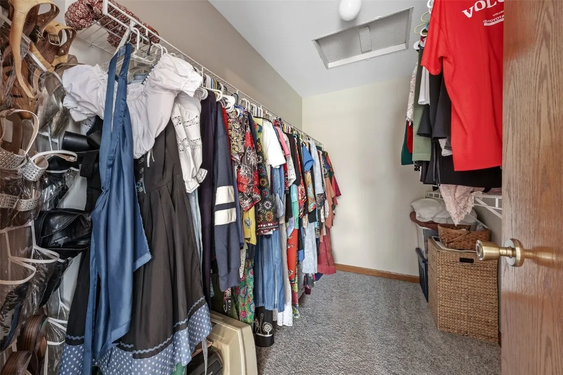 Walk in closet in master bedroom.