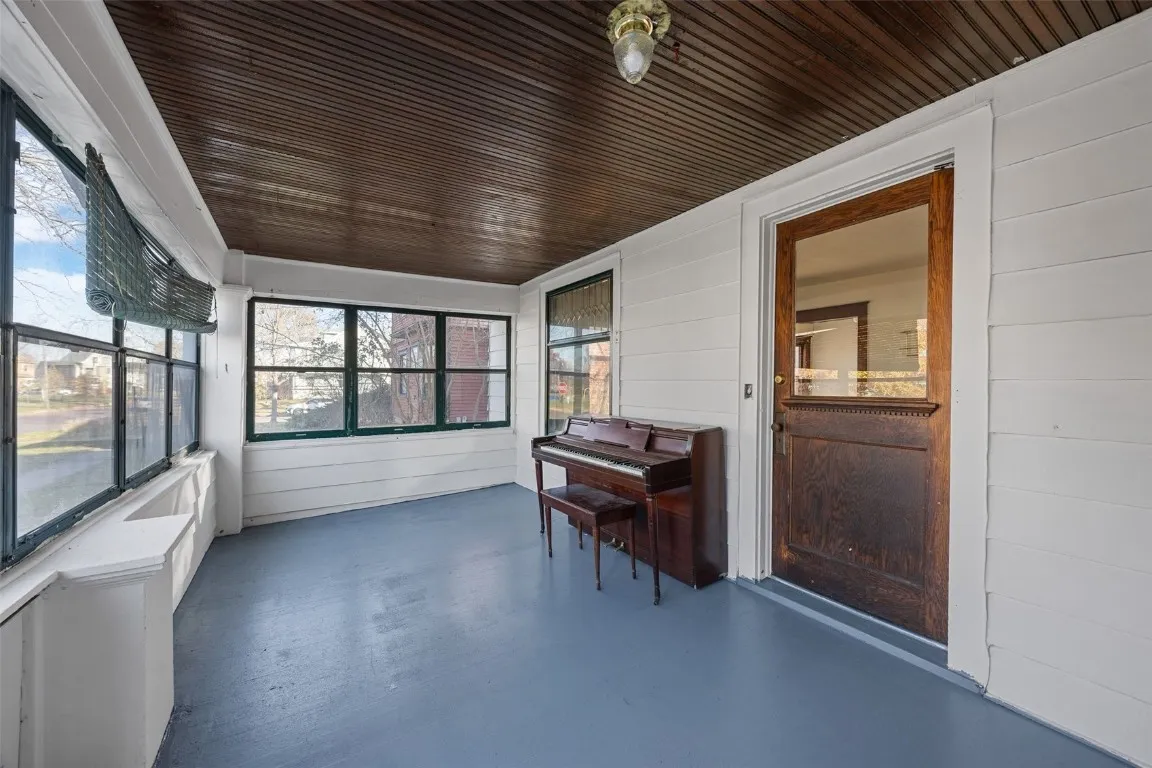 Fully enclosed front porch.  Piano included.