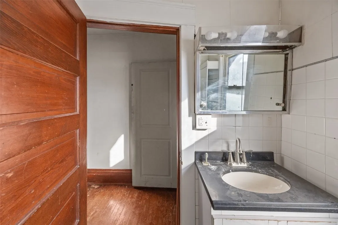 Full bathroom with abundant natural light.