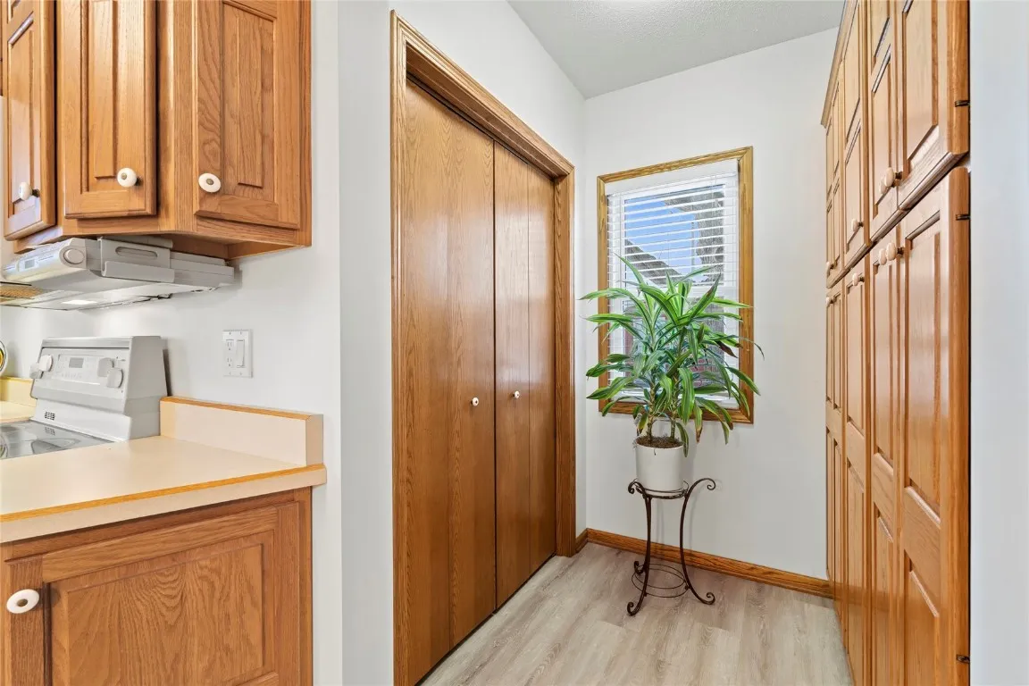 bonus space off of kitchen with closet and built in pantry