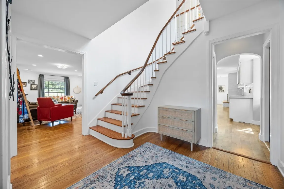 Beautiful curved staircase to the second floor