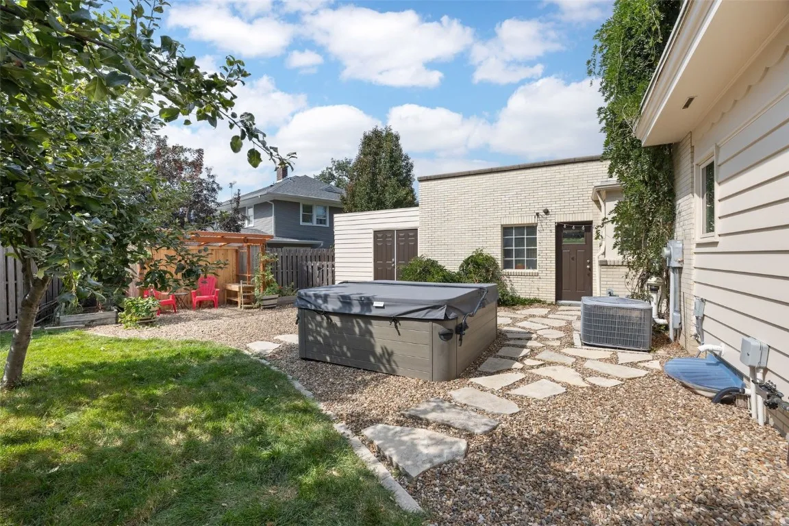 Rear yard and the hot tub stays!