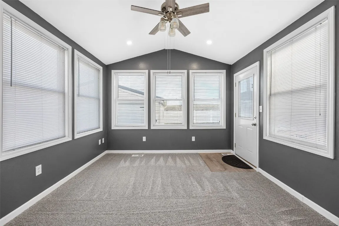 Enhanced sun room: many possible uses (den, office, play room, etc)