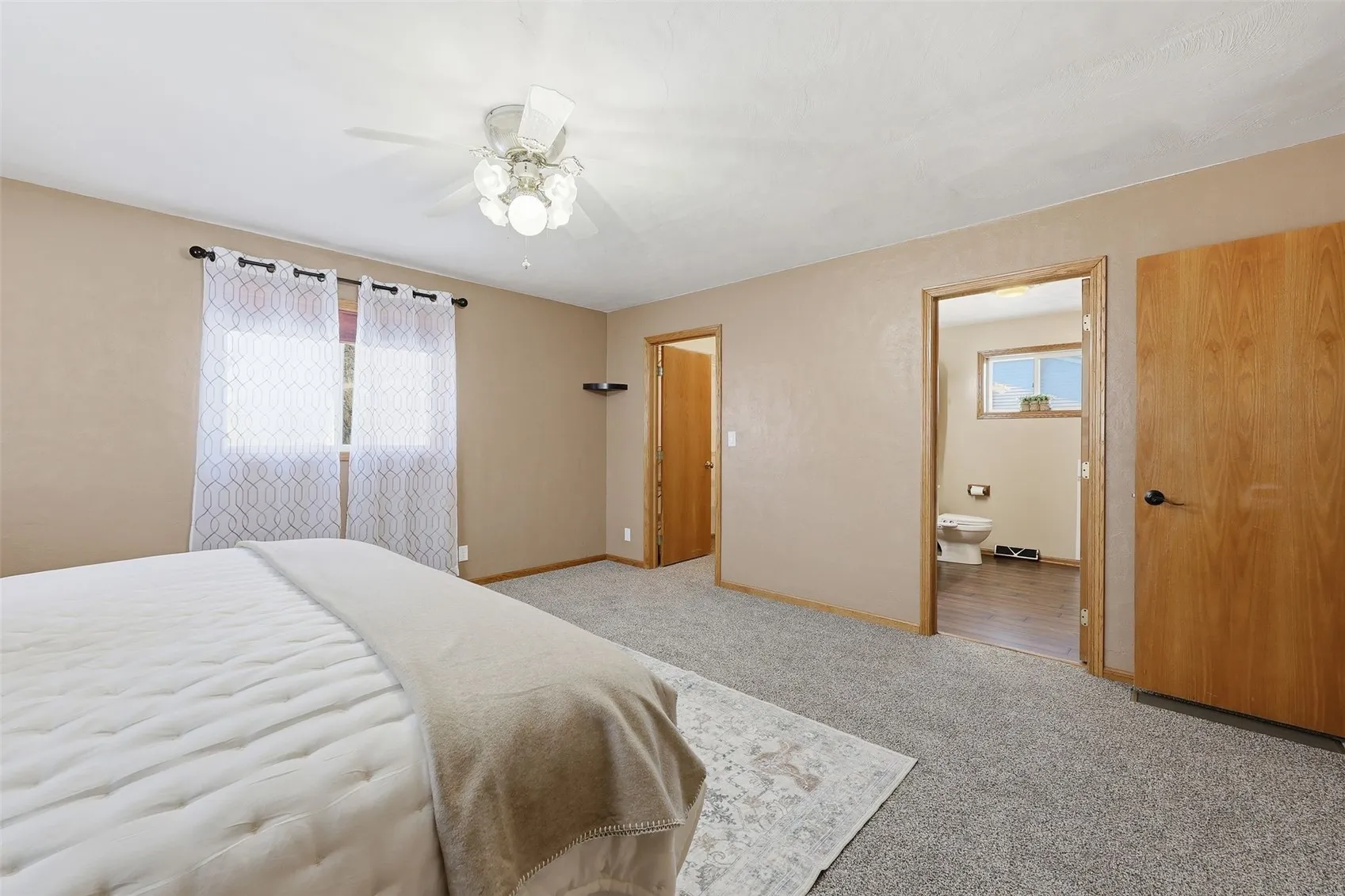 Primary suite has a large walk-in closet.