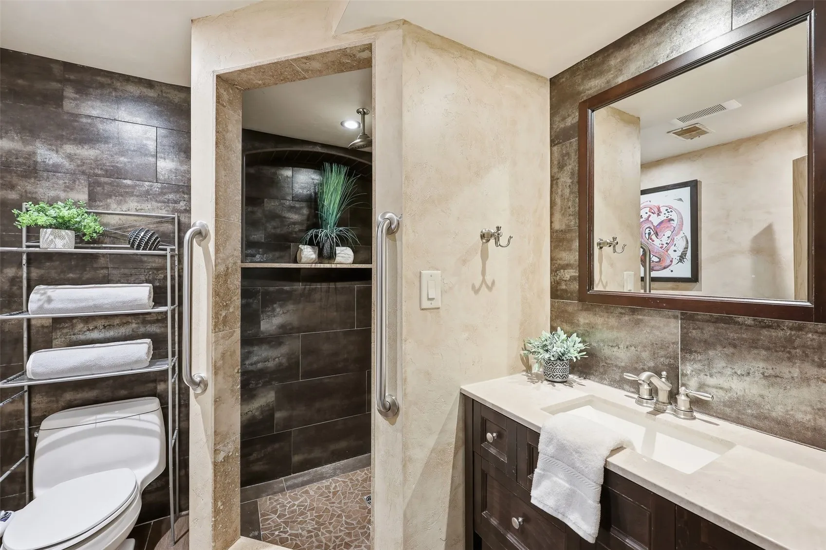 Lower level bathroom with tiled shower and bidet. Stunning!