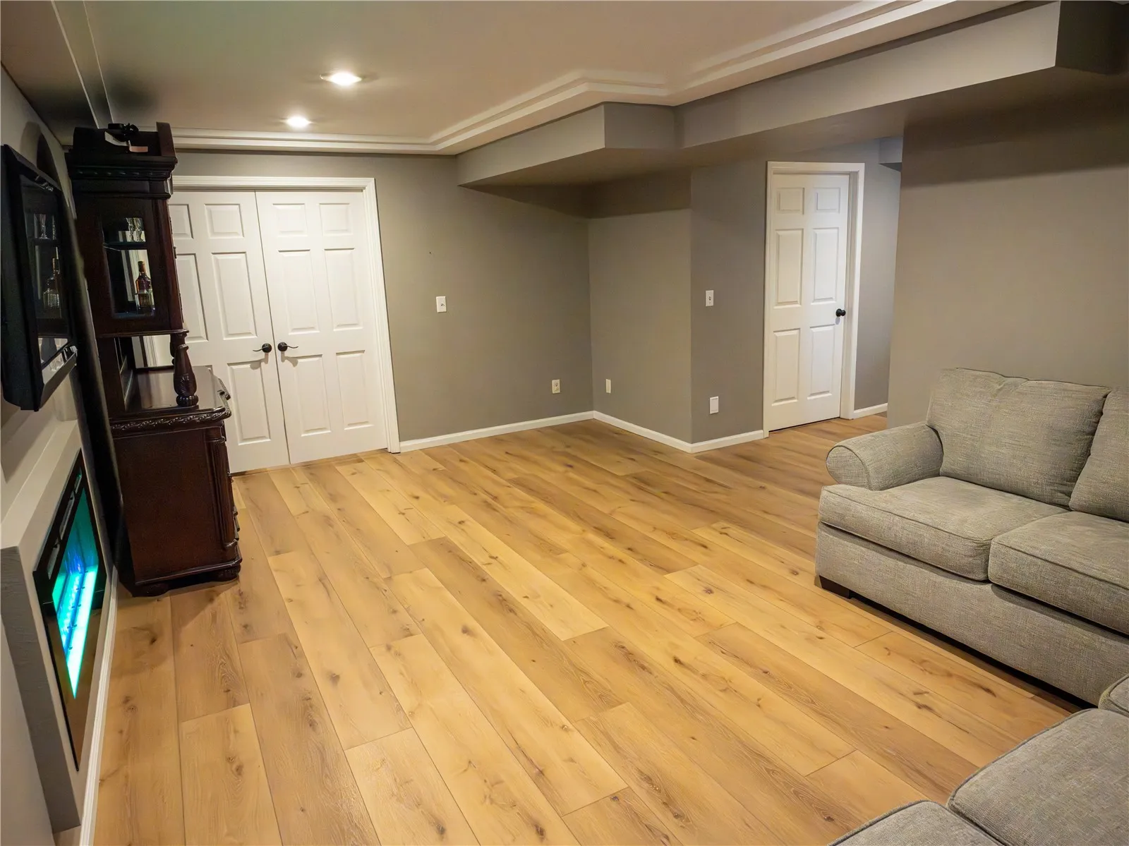 double doors lead to downstairs bedroom