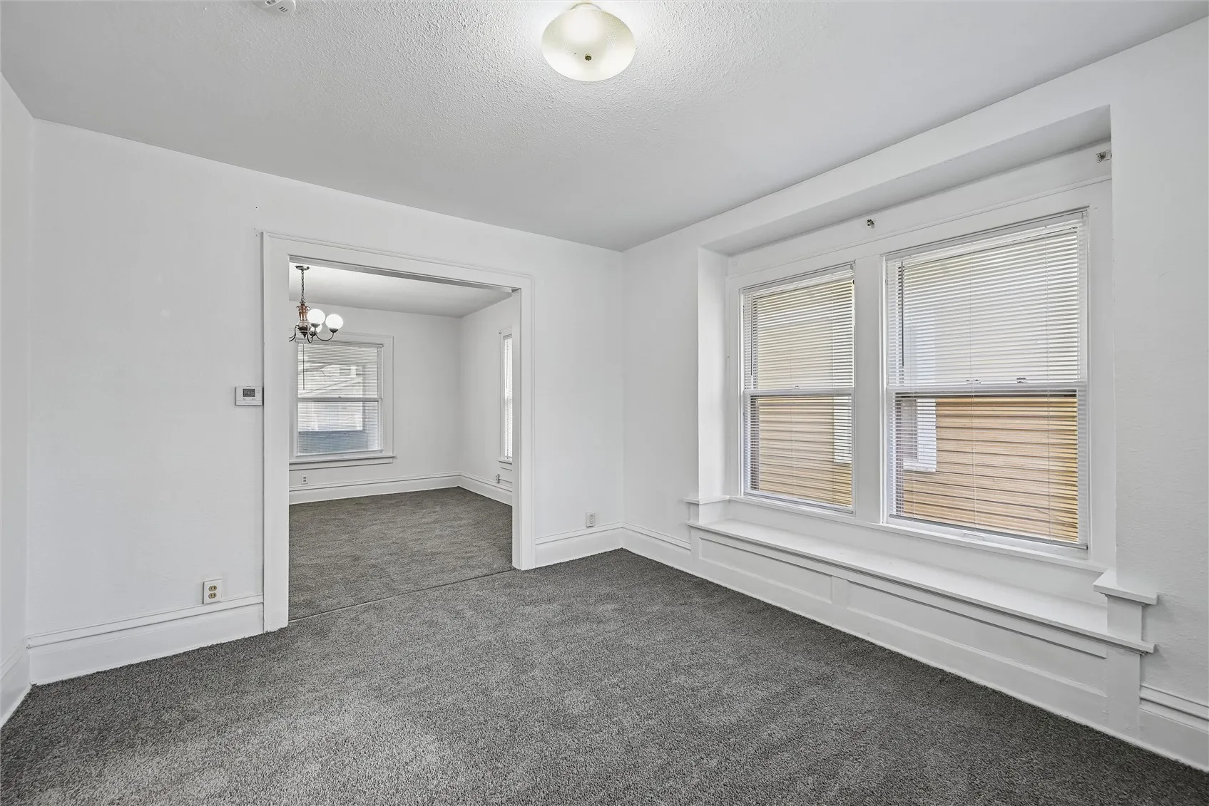 Huge dinning room with window seat.