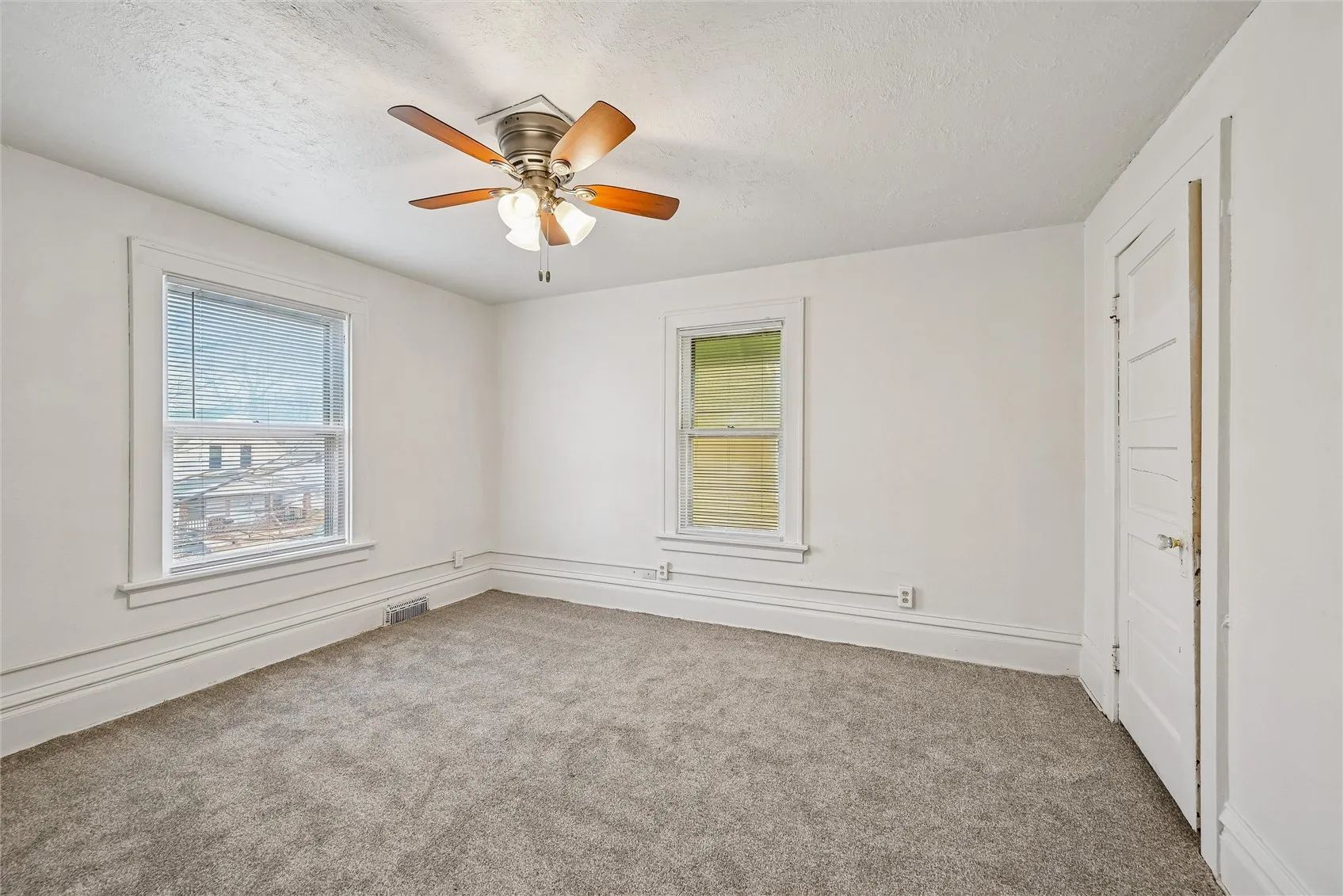 Spacious Bedrooms with ceiling fans