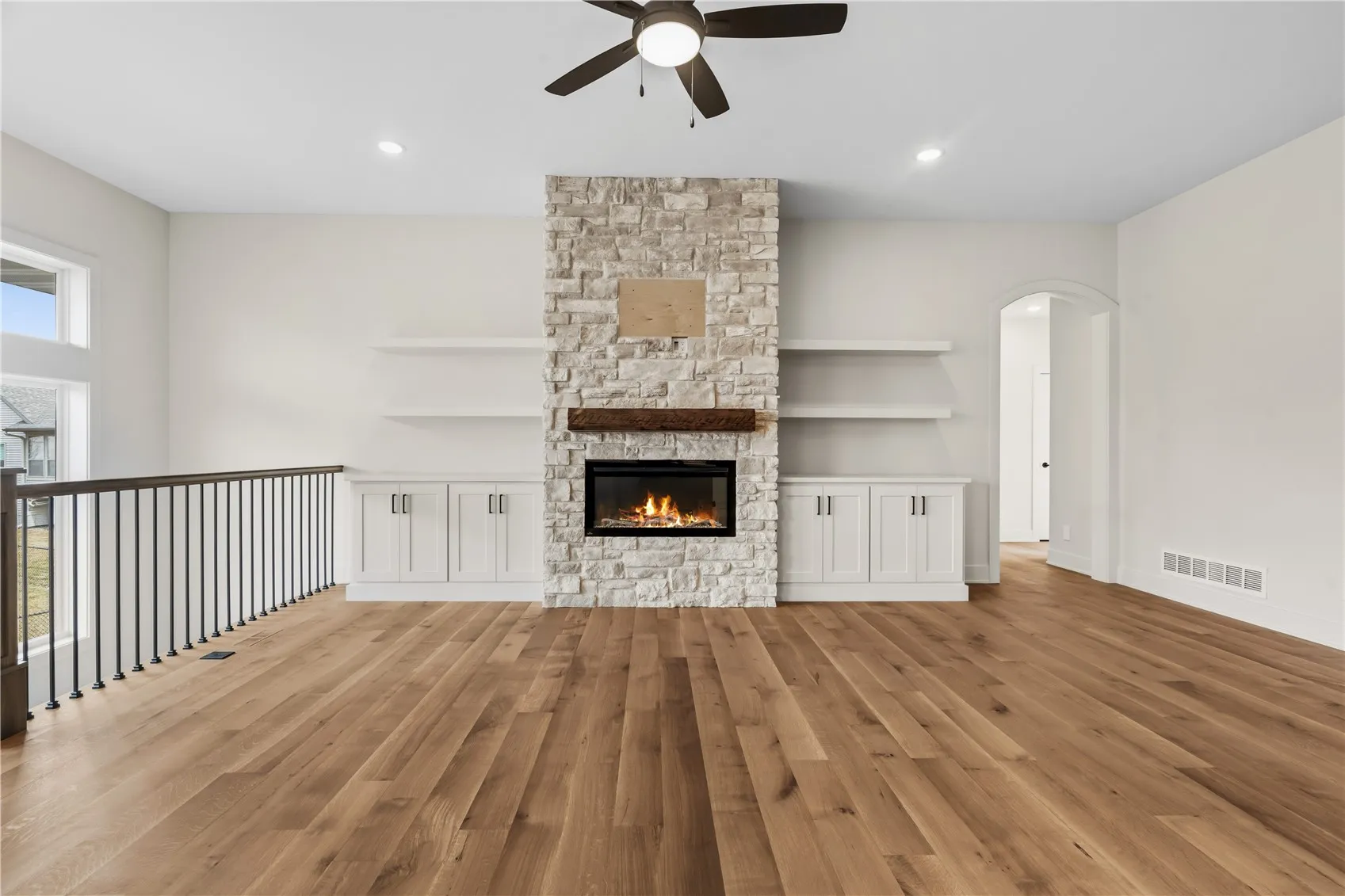 Solid oak wood flooring in the main living and kitchen area.