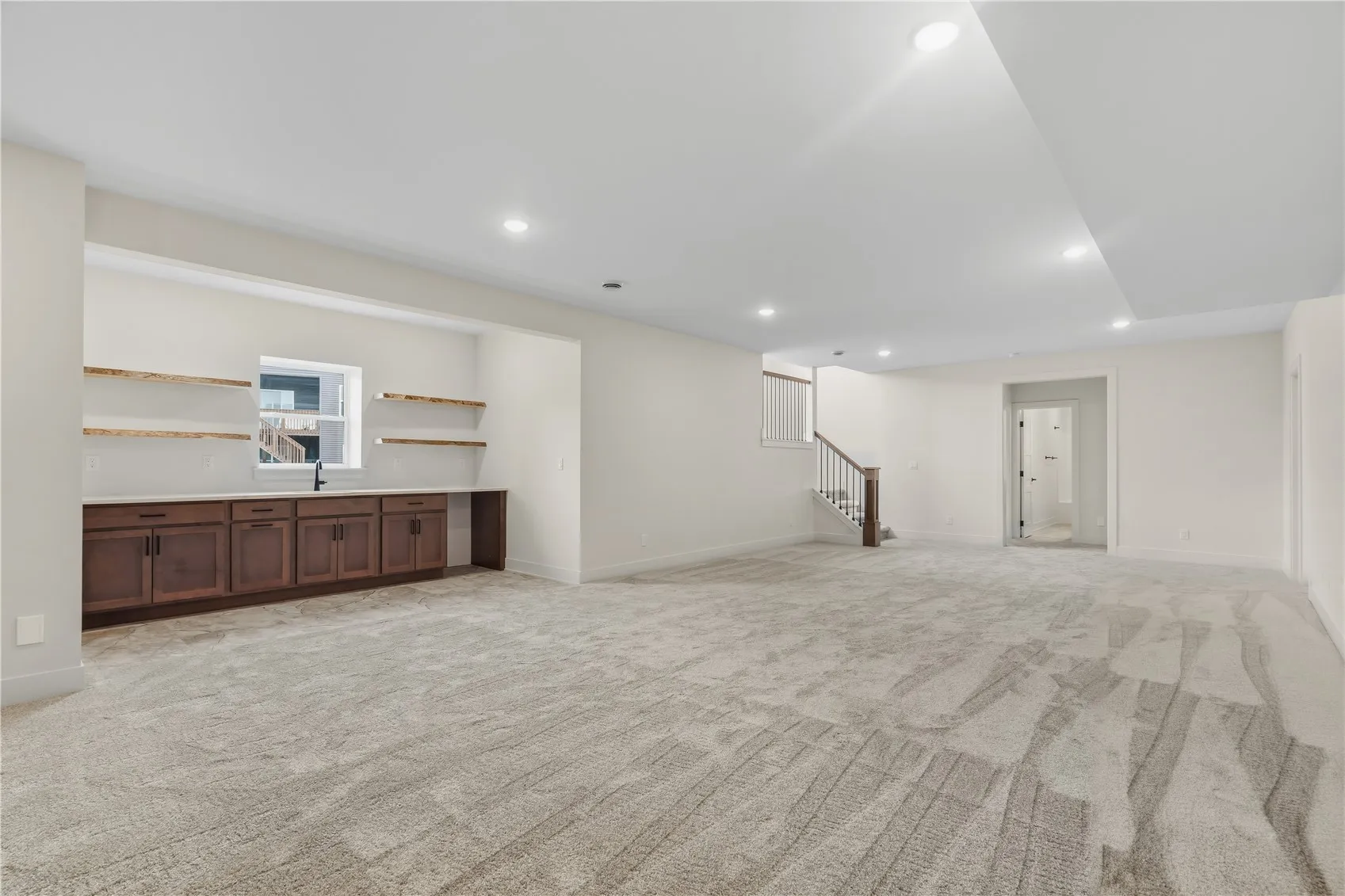 Ample amount of space in the lower level rec room.