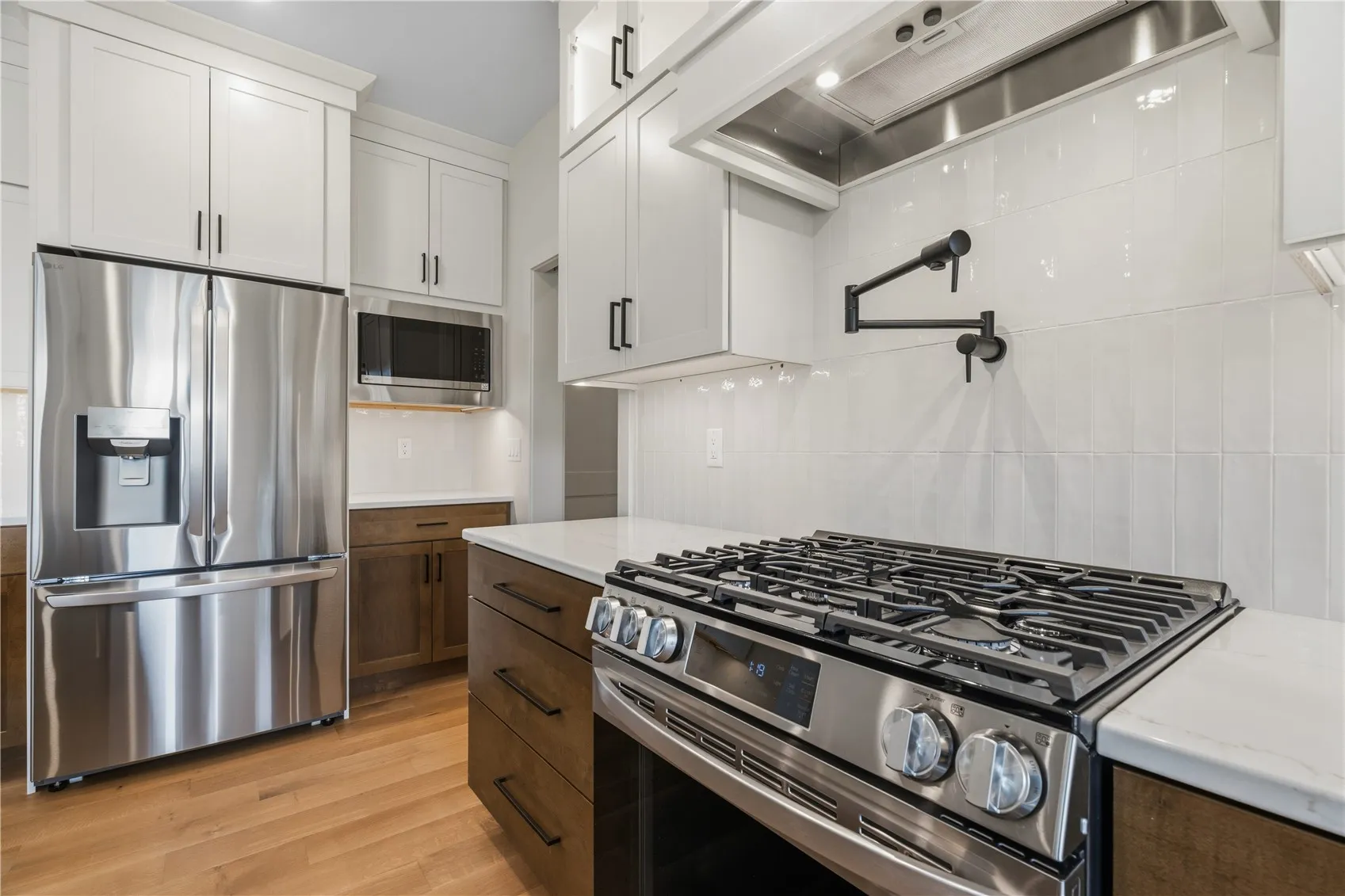 Convenient pot filler above stove.
