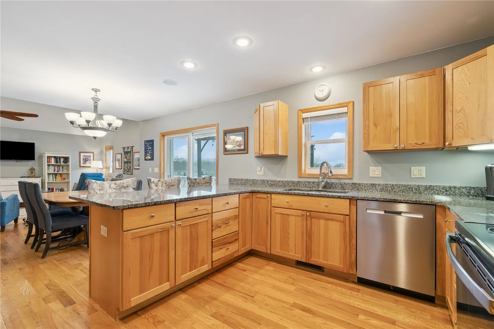 Kitchen area with Hickory cabinets and stainless steel appliances