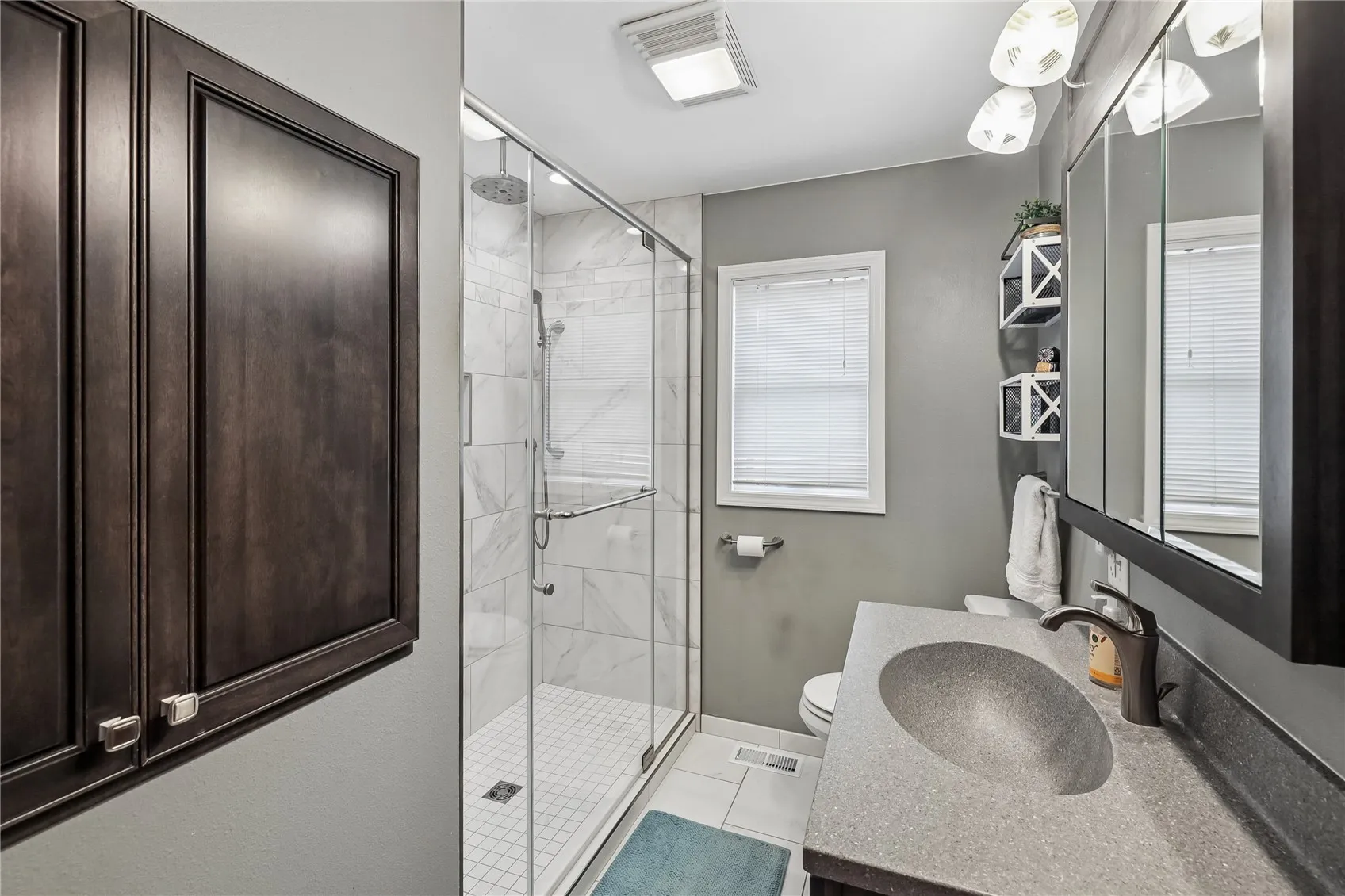 Full bathroom on the main level, tiled shower & heated floor