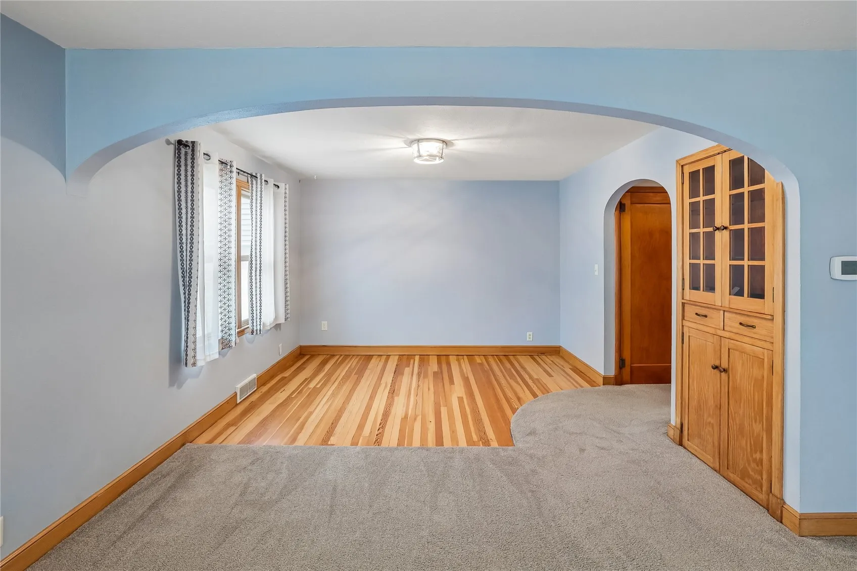 Arch and pretty hardwood floors