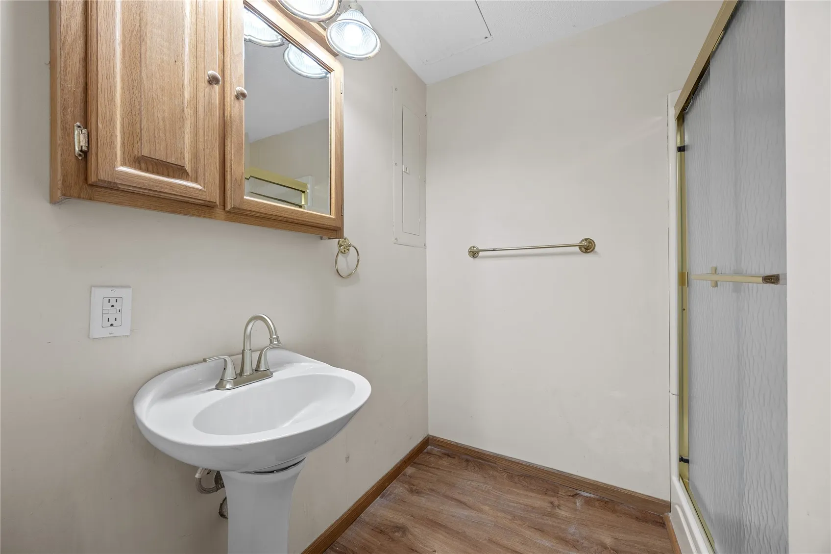 3rd full bathroom, with shower only. Toilet not shown in photo