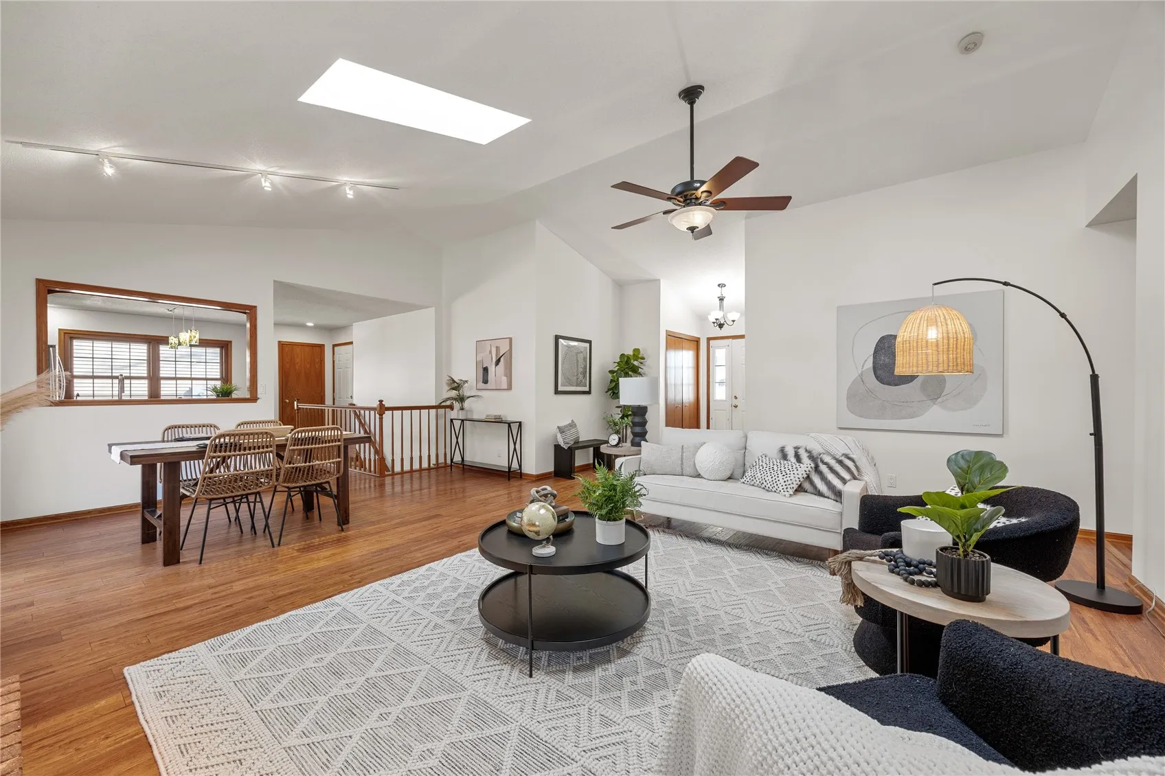 Living room, kitchen in background.