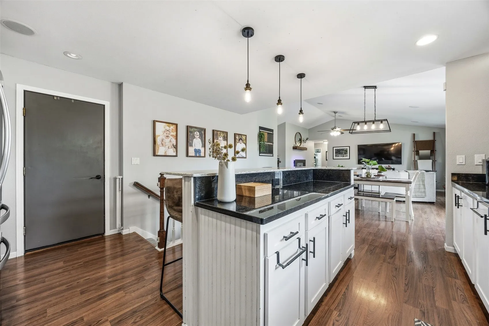 Kitchen with view of dining and living room