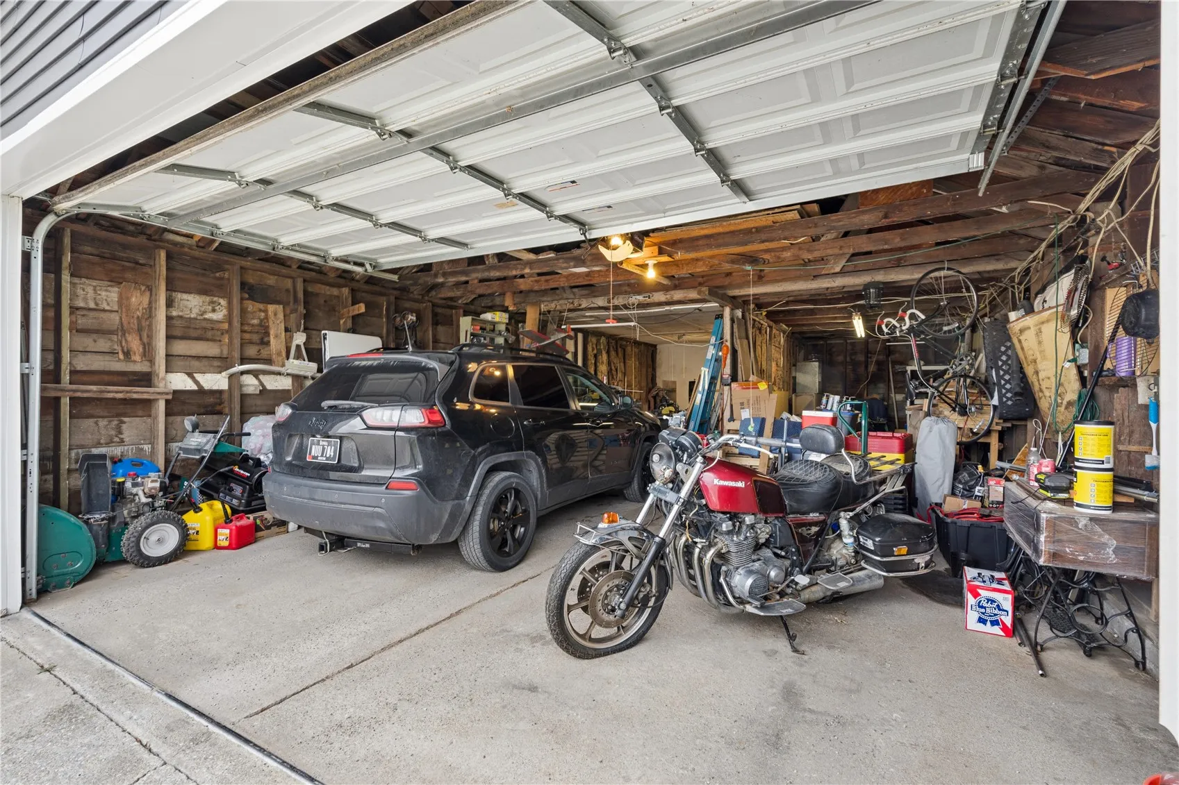 Oversized garage could fit 4 cars tandem, lots of room for toys, cars, hobbies, art studio etc.
